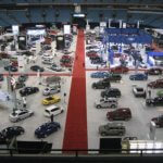A stadium filled with cars for a tradeshow exhibit