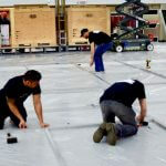 Men building a tradeshow booth